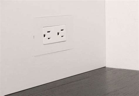 electrical outlet box in baseboard|flush wall mounted electrical outlet.